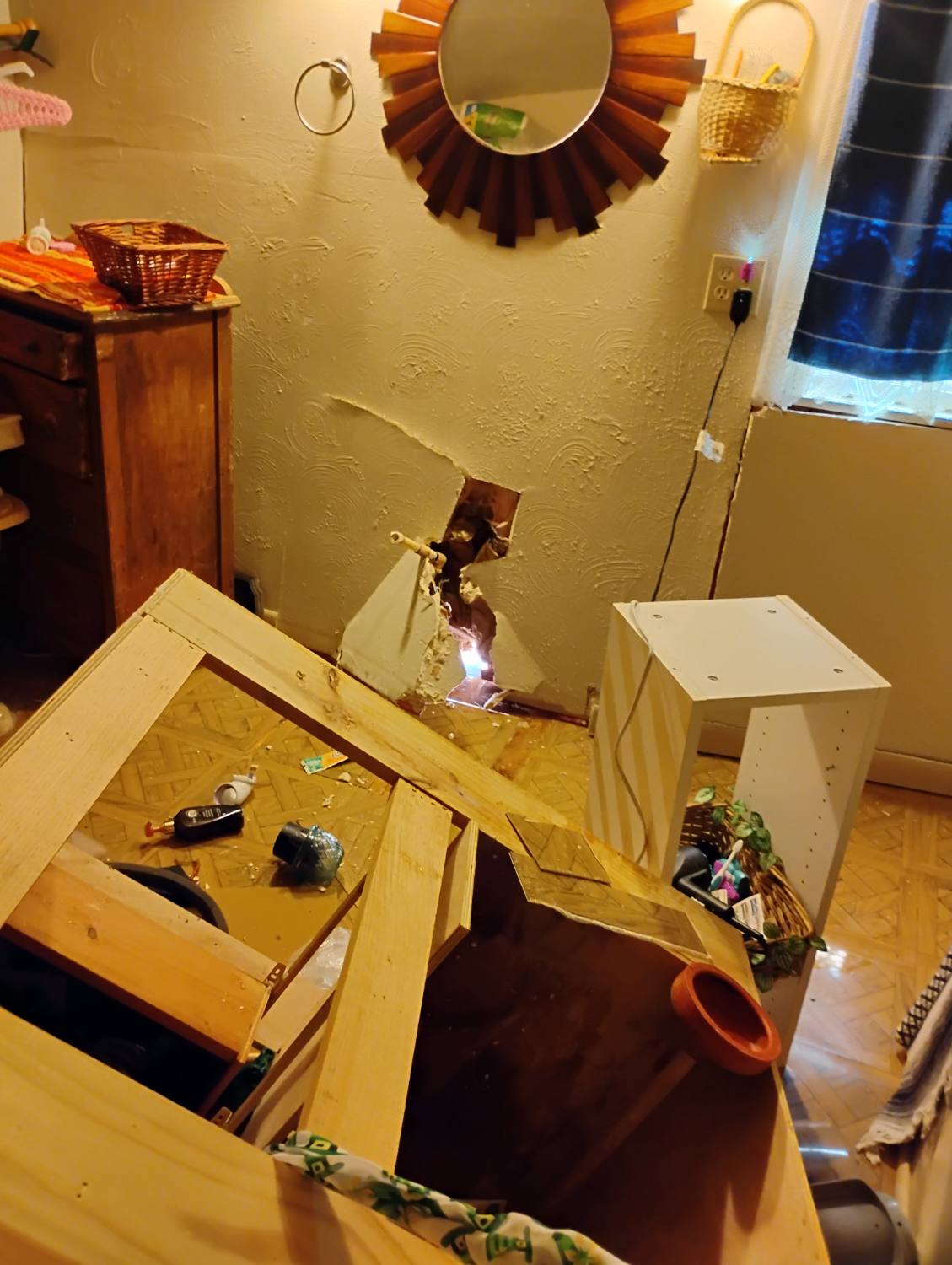 Bathroom and house damage before repair