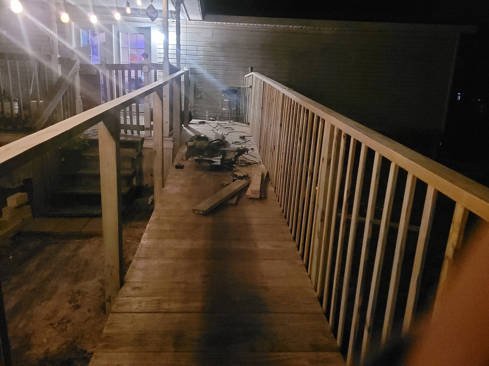 Ramp with railings under construction